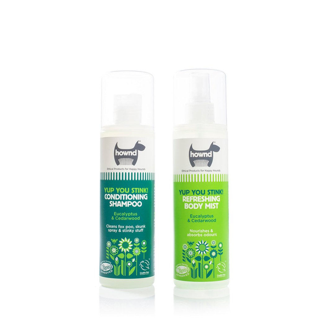 Howd, Yup, You Stink! Dog Shampoo—A happy dog with a fresh, clean coat surrounds a bottle of dog shampoo with Body Mist