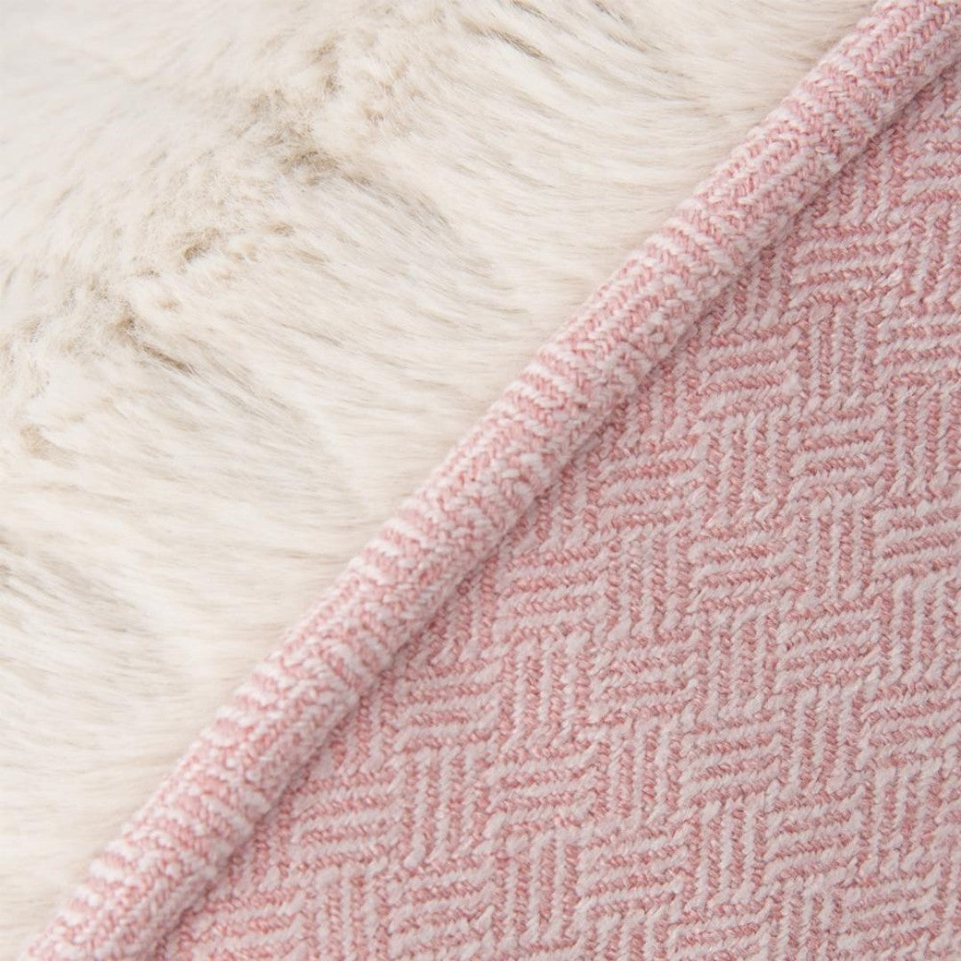 Scruffs Ellen Donut Dog Bed combines stylish design, plush comfort, and eco-friendly features with recycled polyester filling. The machine washable design adds practicality for pet owners.Pink