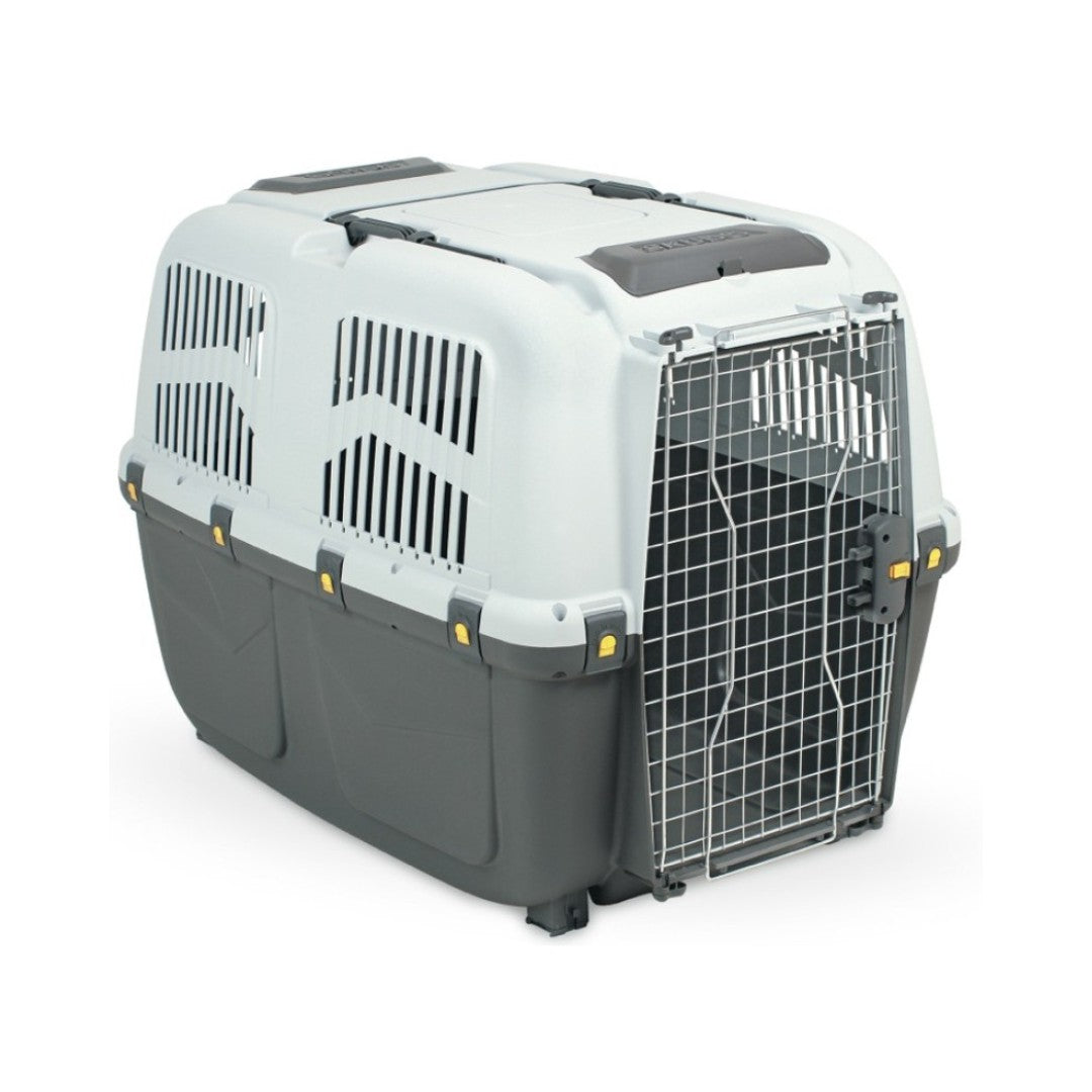 Skudo 7 IATA Approved Pet Carrier for Dogs and Cats, durable plastic construction with metal gate, available in multiple sizes.