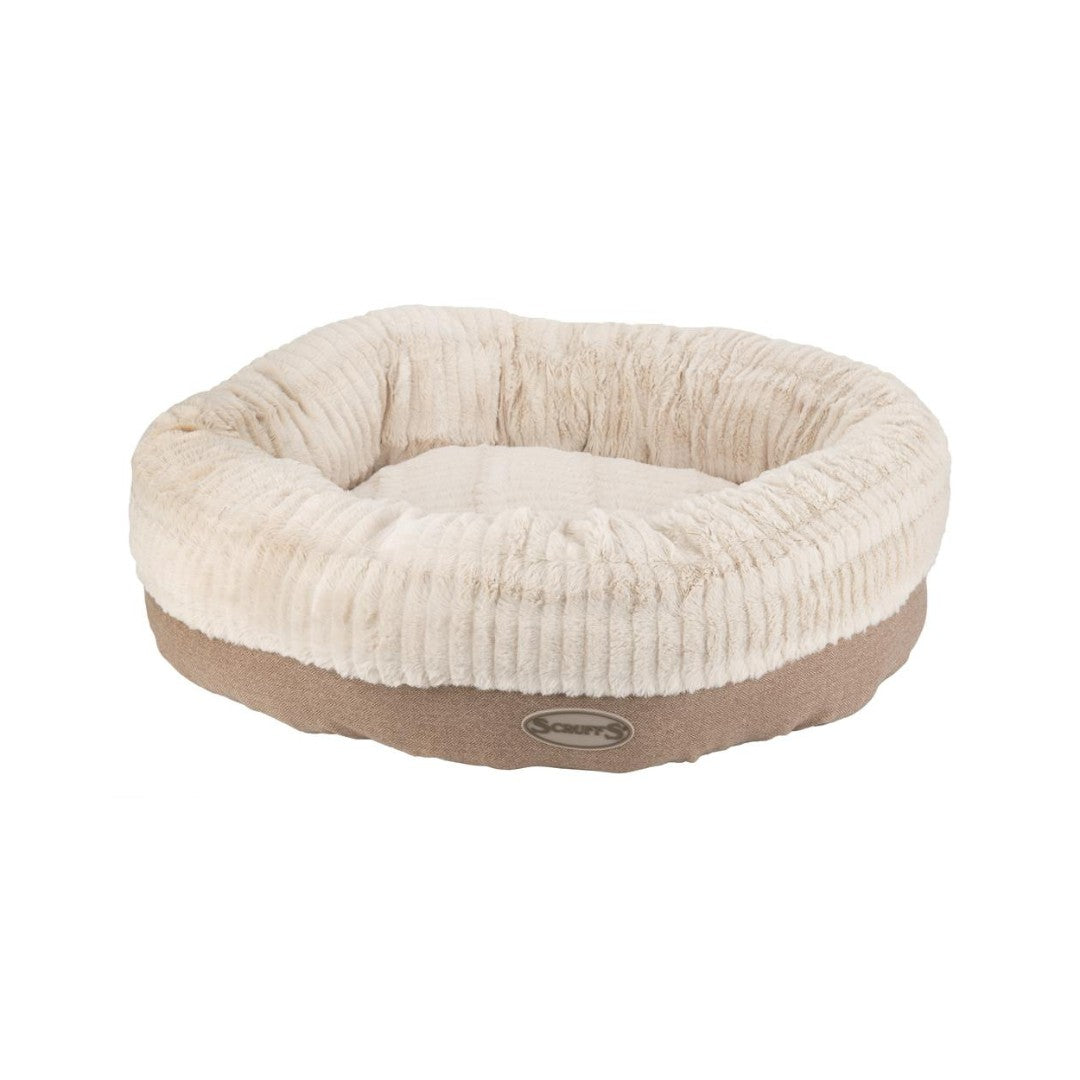 Scruffs Ellen Donut Dog Bed combines stylish design, plush comfort, and eco-friendly features with recycled polyester filling. The machine washable design adds practicality for pet owners.Tan