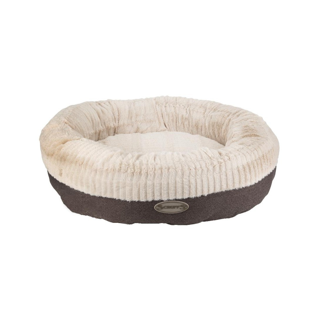Scruffs Ellen Donut Dog Bed combines stylish design, plush comfort, and eco-friendly features with recycled polyester filling. The machine washable design adds practicality for pet owners.Grey