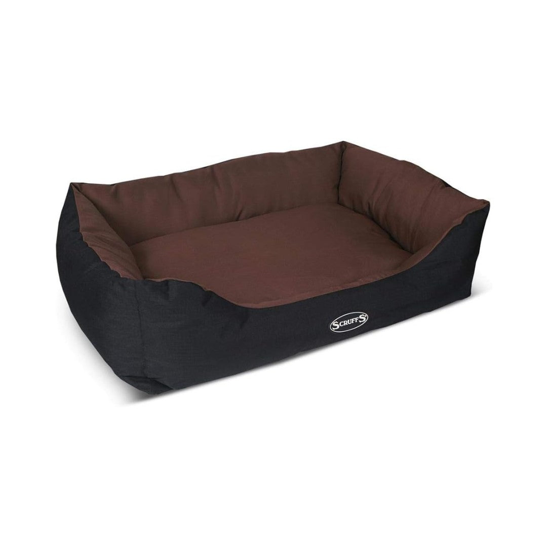 Elevate your pet's comfort with the Scruffs Expedition Box Dog Bed, designed to withstand the rigors of outdoor adventures while maintaining a stylish edge. Chocolate