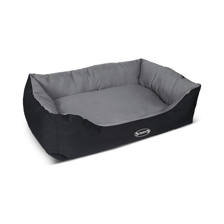 Elevate your pet's comfort with the Scruffs Expedition Box Dog Bed, designed to withstand the rigors of outdoor adventures while maintaining a stylish edge. Graphite