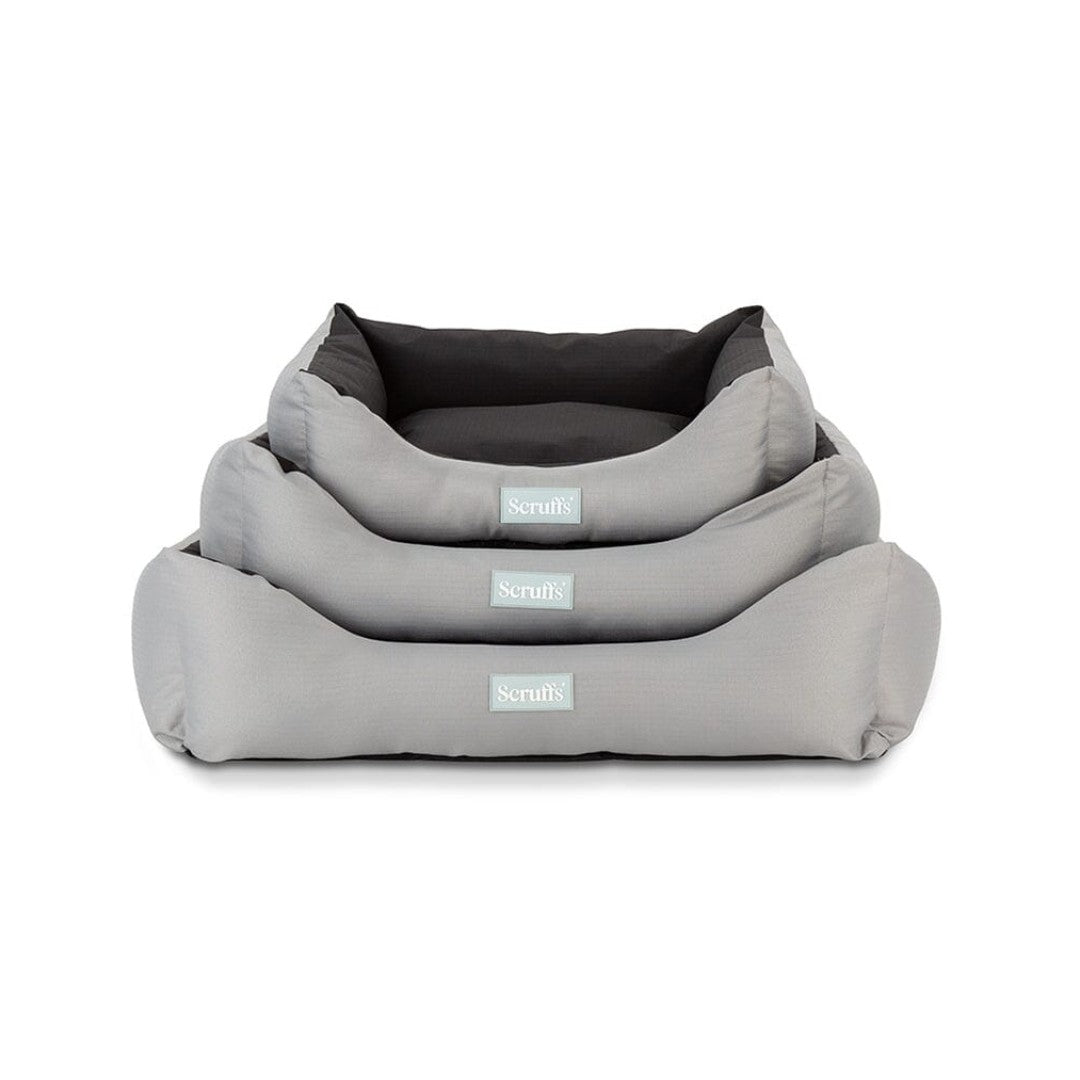 Embark on exciting adventures with your pet, knowing they have the comfort of the Scruffs Expedition Box Dog Bed – where style meets durability on every outdoor journey! Storm Grey