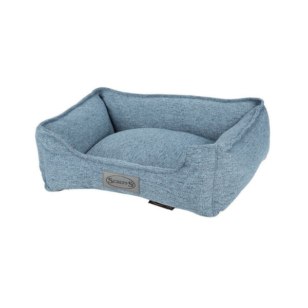 Transform your pet's lounging experience with the Scruffs® Manhattan Box Dog Bed, combining luxury, style, and comfort in one exquisite package. Blue