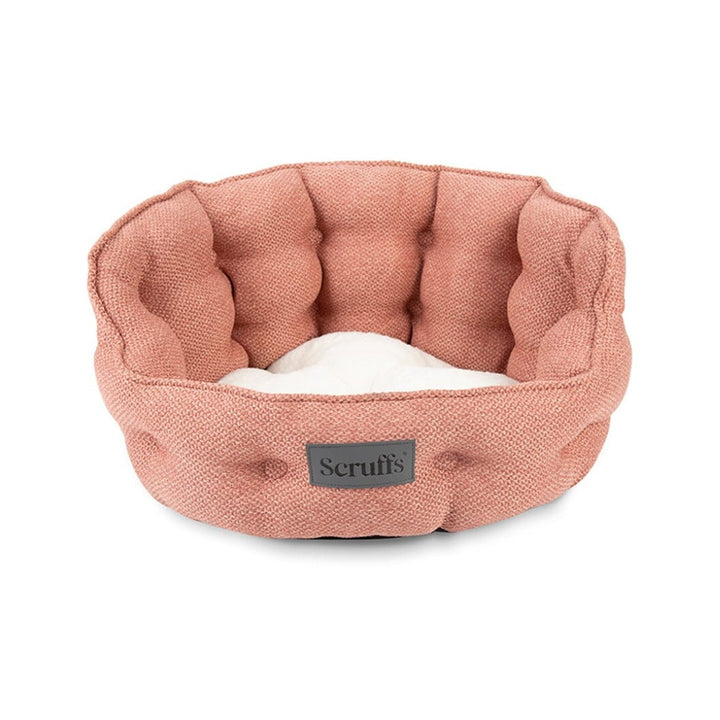 Indulge your discerning feline or small canine companions in the luxury of the Scruffs Seattle Cat Bed. Pink