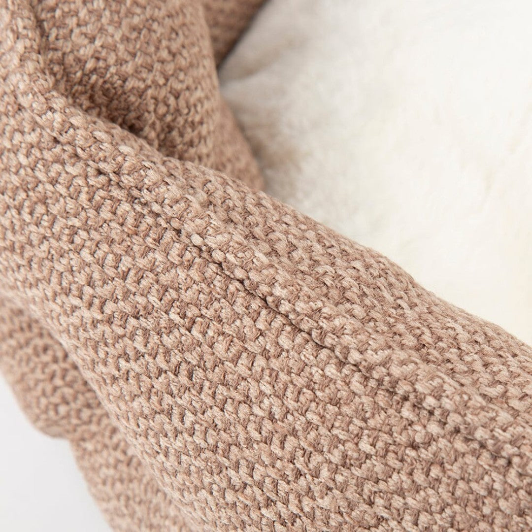 Indulge your discerning feline or small canine companions in the luxury of the Scruffs Seattle Cat Bed. 