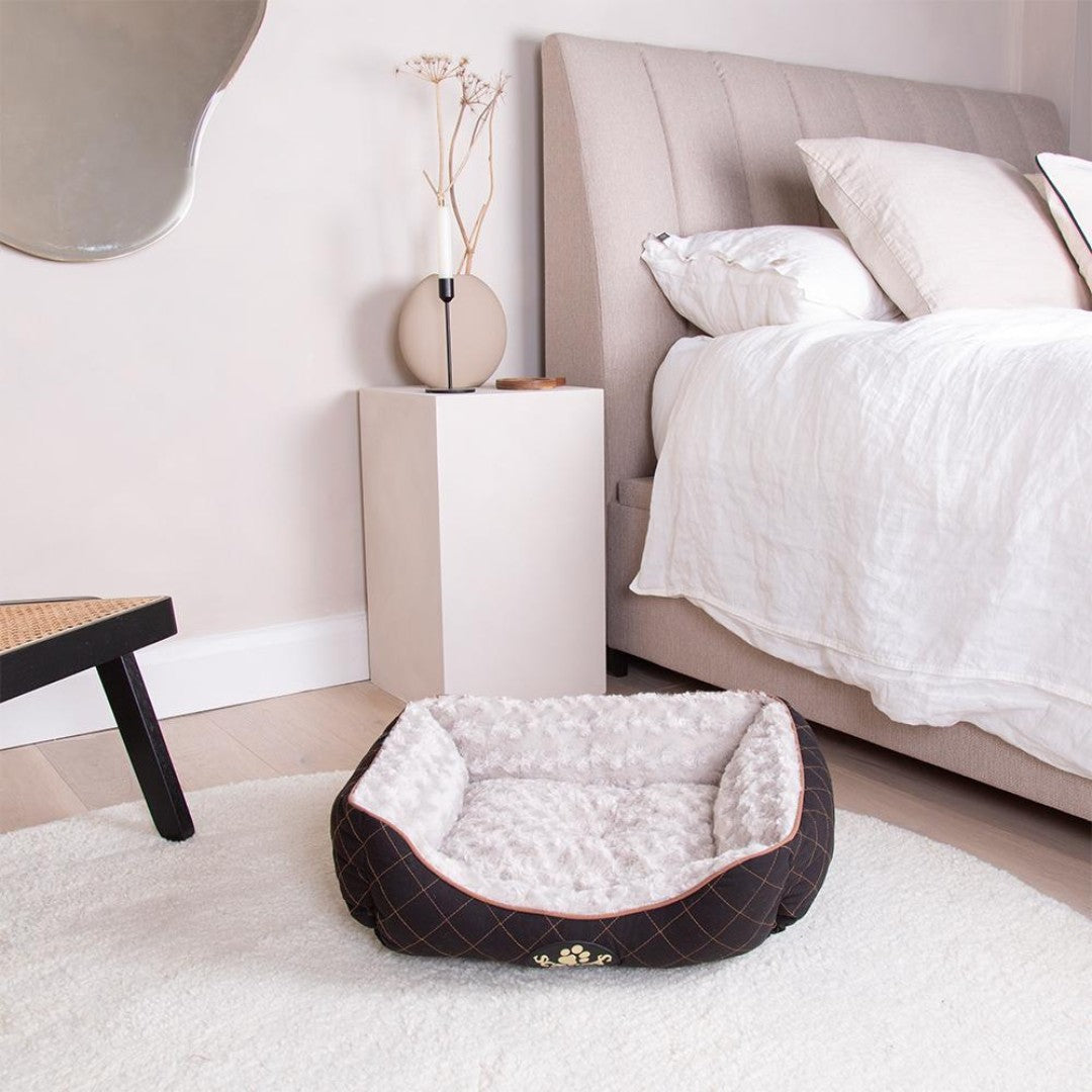 The Scruffs® Wilton dog bed collection combines style and comfort to create the perfect haven for your furry friend. They are crafted with a quilted outer fabric in a charming diamond pattern.