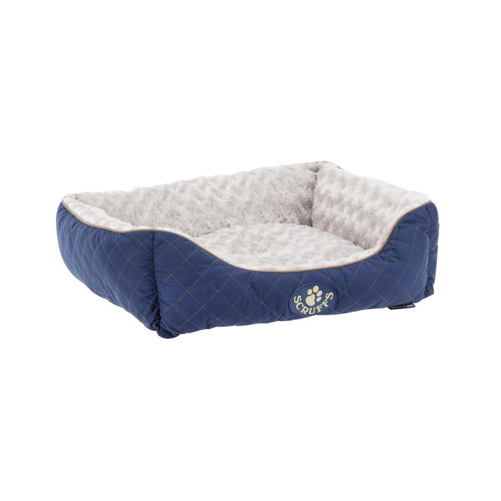 The Scruffs® Wilton dog bed collection combines style and comfort to create the perfect haven for your furry friend. They are crafted with a quilted outer fabric in a charming diamond pattern. Blue