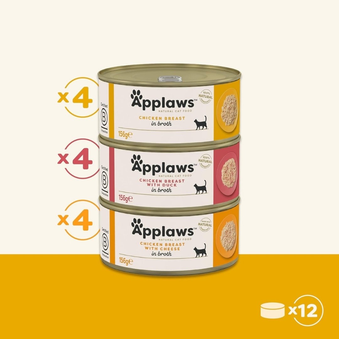 Three cans of Applaws cat food with different flavors on a white background