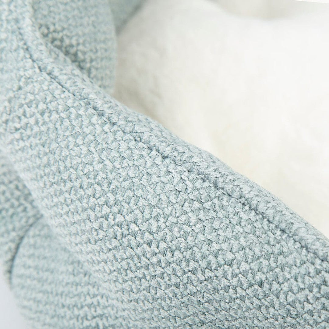 Indulge your discerning feline or small canine companions in the luxury of the Scruffs Seattle Cat Bed. 