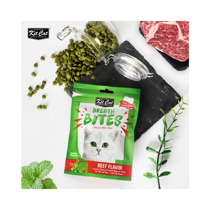 Kit Cat Breath Bites Beef Bursting with the tasty flavors your cat will love, Crunchy treats designed to help keep your cat's teeth clean by reducing plaque AD.
