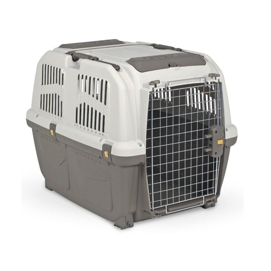 Skudo IATA Approved Pet Carrier for Dogs and Cats, durable plastic construction with metal gate, available in multiple sizes.