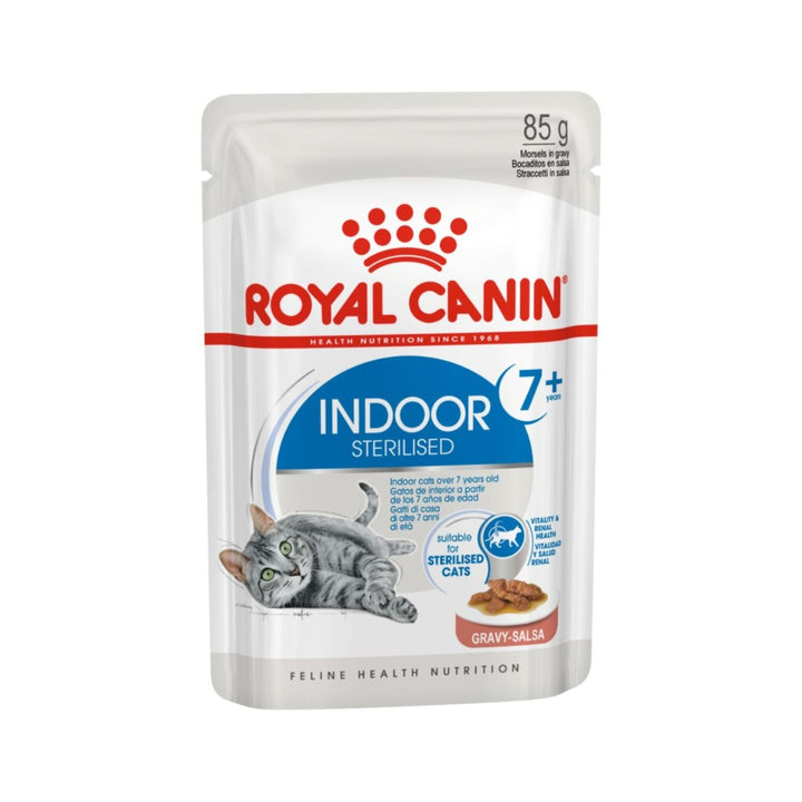 Pouches of Royal Canin Indoor Sterilised 7+ Gravy Cat Wet Food surrounded by happy senior indoor cats enjoying their meal.