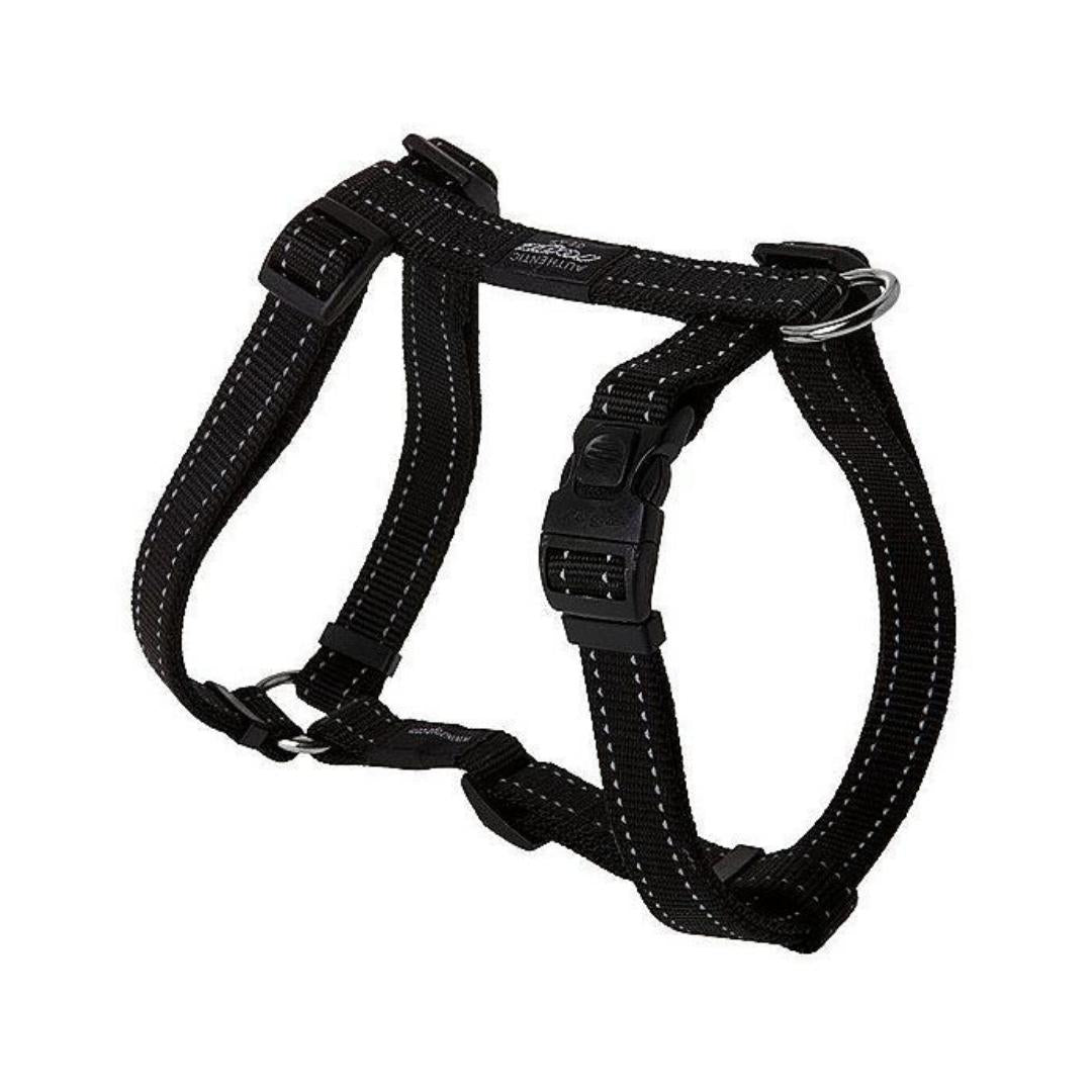 Black dog harness with reflective stitching and quick-release clasp, designed for small dogs.