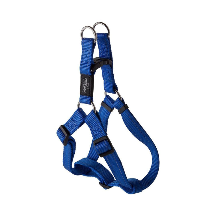 A Blue Rogz Utility Step-In Dog Harness with adjustable straps and a metal D-ring attachment.