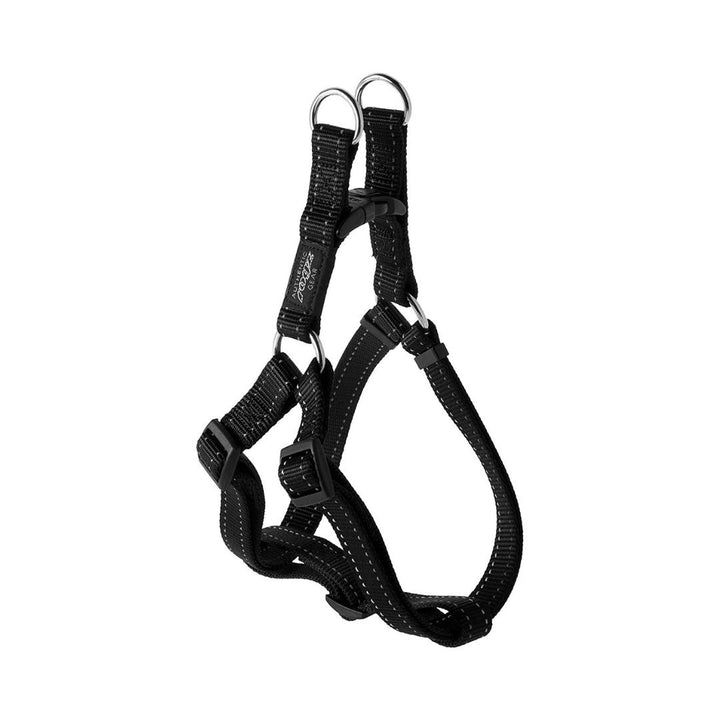 A black Rogz Utility Step-In Dog Harness with adjustable straps and a metal D-ring attachment.